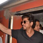 Mathura: Actor Shah Rukh Khan greets his fans at Mathura railway station while travelling by train to Delhi for promotion of his upcoming film Raees on Jan. 24, 2017. (Photo: IANS) by .