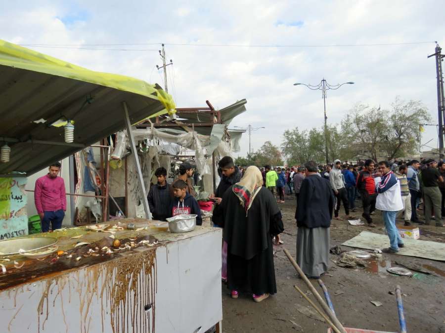 Baghdad, Jan 2, 2017 (Xinhua) People gather at the site of a car bomb attack in Baghdad, Iraq, on Jan. 2, 2017. Up to 35 people were killed and 61 others wounded on Monday in a car bomb explosion at a Shiite neighborhood in eastern Baghdad, an Interior Ministry source told Xinhua. (Xinhua/Khalil Dawood)(gl/IANS)