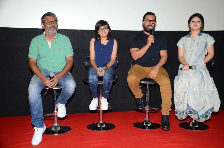 Mumbai: Filmmaker Nitesh Tiwari, actors Suhani Bhatnagar, Aamir Khan and Zaira Wasim during the song launch of film Dangal in Mumbai, on Nov 12, 2016. (Photo: IANS)