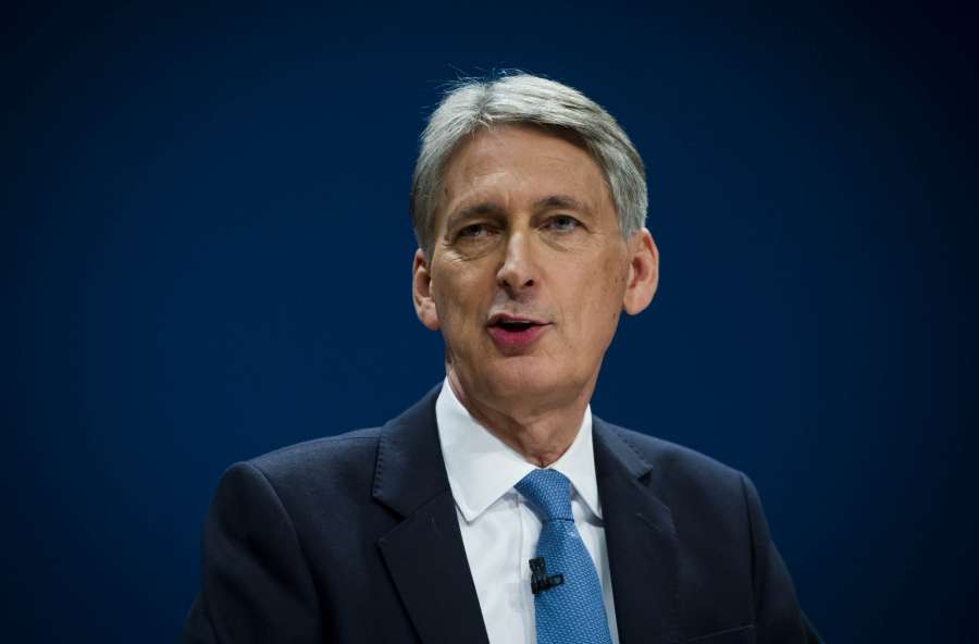 BIRMINGHAM, Oct. 3, 2016 (Xinhua) -- British Chancellor of the Exchequer Philip Hammond delivering a speech on Day Two of the Conservative Party Conference in Birmingham, England, on Oct. 3, 2016. (Xinhua/IANS)
