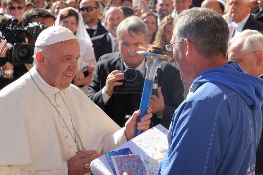 Vatican City: Pope Francis holds the Sri Chinmoy Oneness Home Peace Torch at Vatican City. Also seen former director of Peace Run Salil Wilson. (Photo: IANS)