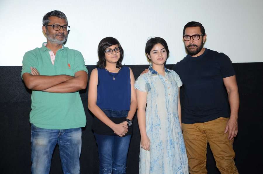 Mumbai: Filmmaker Nitesh Tiwari, actors Suhani Bhatnagar, Aamir Khan and Zaira Wasim during the song launch of film Dangal in Mumbai, on Nov 12, 2016. (Photo: IANS) by .