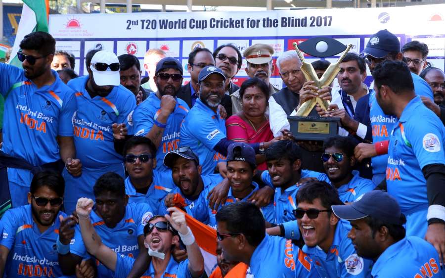 Bengaluru: Karnataka Governor Vajubhai Rudabhai Vala presents the T20 World Cup for Blind trophy to the Indian Blind Cricket team after India defeated Pakistan at M Chinnaswamy Staidum in Bengaluru, on Feb 12, 2017. (Photo: IANS) by .