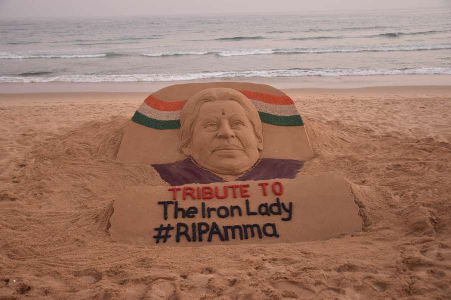 Puri: Renowned sand artist Sudarsan Pattnaik pays tribute to Tamil Nadu Chief Minister J Jayalalithaa who died at Chennai's Apollo Hospital; in Puri beach on Dec 6, 2016. Jayalalithaa died at a Chennai hospital on Monday night, a day after she suffered a cardiac arrest. She was 68. (Photo: IANS) by .