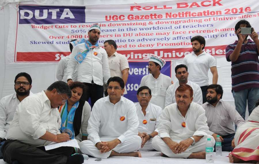 New Delhi: Members of Delhi University Teachers Association (DUTA) stage a demonstration at Jantar Mantar in New Delhi, on June 14, 2016. (Photo: IANS) by .