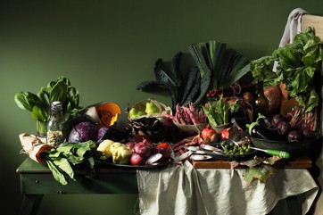 Fruits and vegetables on table by . 