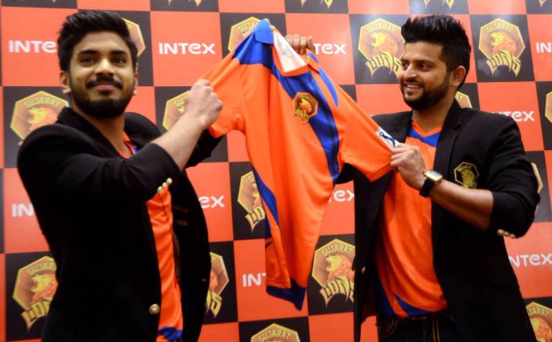 New Delhi: Entrepreneur and owner of the Indian Premier League`s Gujarat Lions Keshav Bansal and team`s captain Suresh Raina unveils the team jersey for IPL-2016 during a programme in New Delhi, on Feb 20, 2016. (Photo: IANS) by .