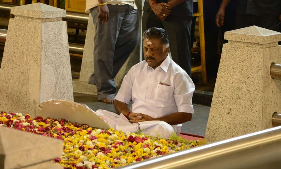 Chennai: Tamil Nadu Chief Minister O. Panneerselvam sitting in meditation in front former Tamil Nadu CM Jayalalithaa's memorial at Chennai's Marina beach on Feb. 7, 2017. (Photo: IANS) by .