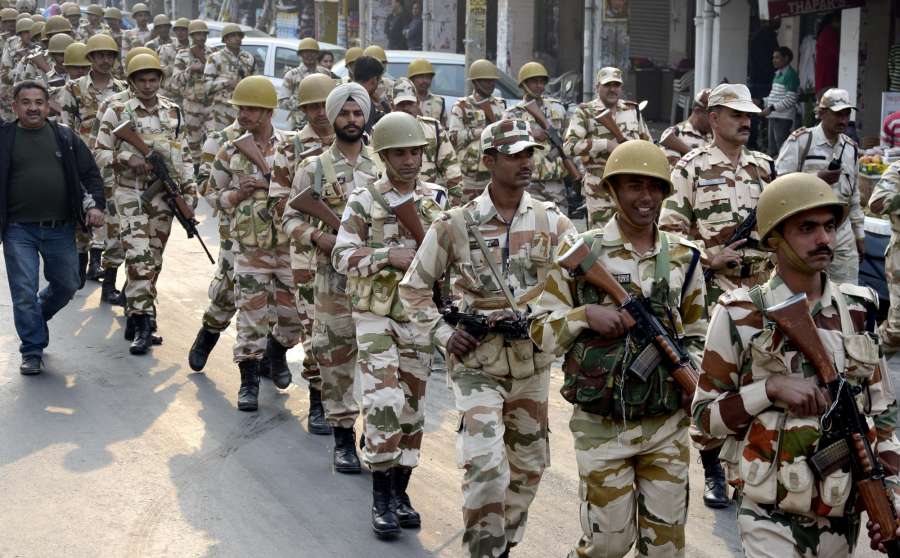 Paramilitary forces conduct flag march in Amritsar after the Model Code of Conduct came into force following the poll dates announcement, on Jan 5, 2017. (Photo: IANS) by .