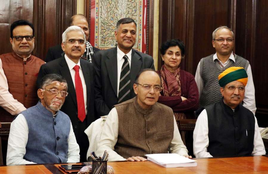 New Delhi: Union Minister for Finance and Corporate Affairs Arun Jaitley gives final touches to the Union Budget 2017-18, in New Delhi on Jan 31, 2017. Also seen Minister of State for Finance and Corporate Affairs Arjun Ram Meghwal, the Minister of State for Finance Santosh Kumar Gangwar, the Secretaries of the Ministry along with the full budget team. (Photo: IANS) by .