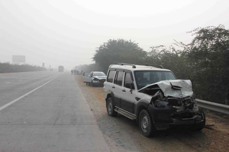 Uttar Pradesh: The mangle remain of the vehicles that met with an accident at Yamuna expressway in Uttar Pradesh on Dec 24, 2016. (Photo: IANS) by .