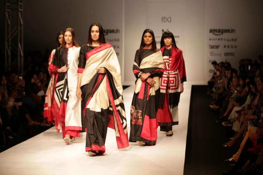 New Delhi: Models display the creation of fashion designer Krishna Mehta during the Amazon India Fashion Week Autumn Winter 2017 in New Delhi on March 15, 2017. (Photo: Amlan Paliwal/IANS) by .