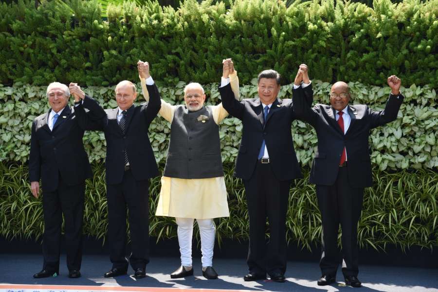 Goa: Prime Minister Narendra Modi, Russian President Vladimir Putin, Chinese President Xi Jinping, South African President Jacob Zuma and Brazilian President Michel Temer during at the BRICS Summit venue, in Goa on Oct 16, 2016. (Photo: IANS) by .