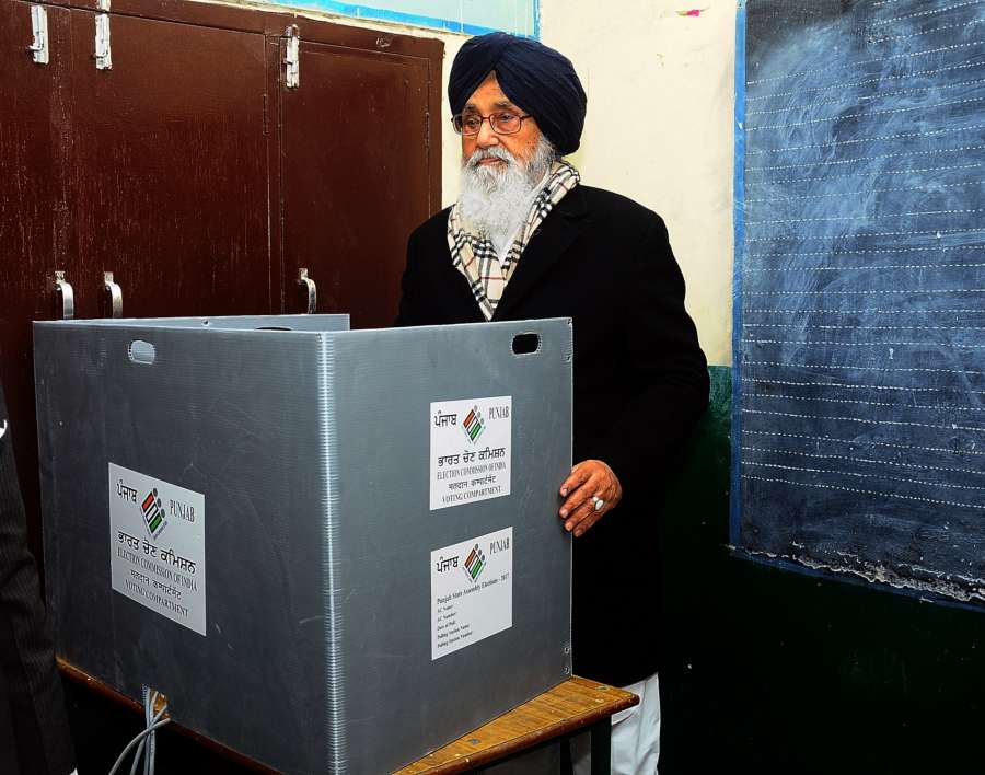 Muktsar: Punjab Chief Minister Parkash Singh Badal casting his vote at a polling booth during Punjab Legislative Assembly polls in Muktsar, on Feb 4, 2017. (Photo: IANS) by .