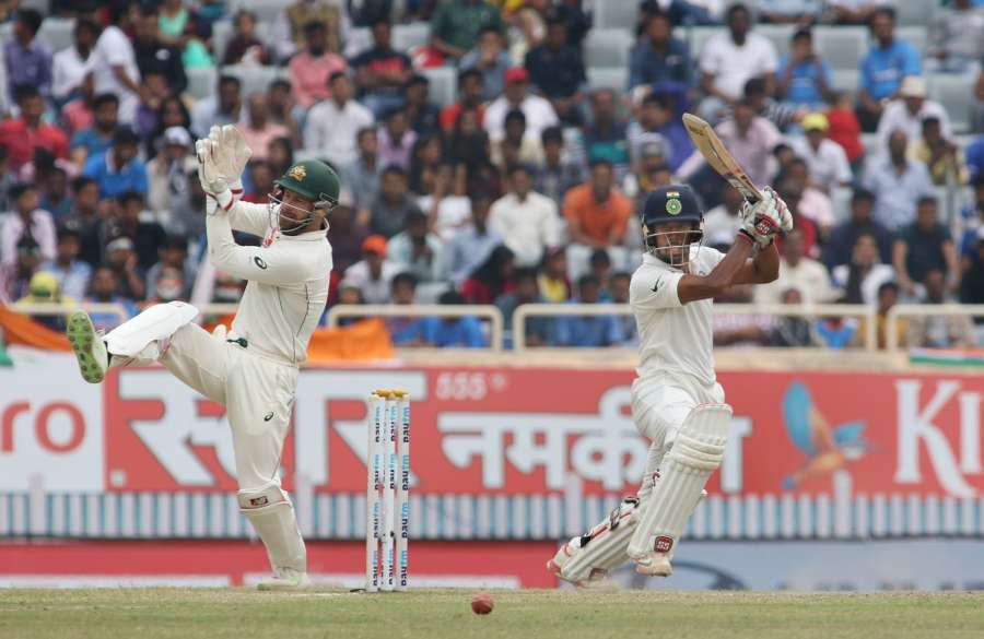 Ranchi: Indian wicket-keeper Wriddhiman Saha playing a shot during the fourth day of the third test cricket match against Australia in Ranchi on March 19, 2017. (Photo: Surjeet Yadav/IANS) by .