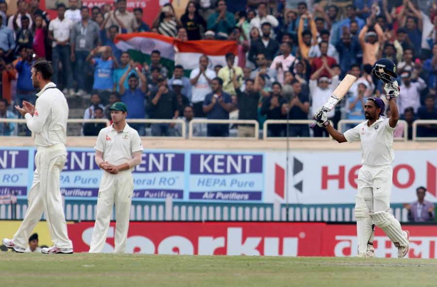 Ranchi: Indian Wicket-keeper Wriddhiman Saha celebrates his century during the fourth day of the third test cricket match against Australia in Ranchi on March 19, 2017. (Photo by Surjeet Yadav/IANS) by .