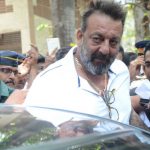 Mumbai: Actor Sanjay Dutt arrives to appear before a Mumbai court in response to an arrest warrant issued against him two days ago on April 17, 2017. The warrant was later cancelled by the court. (Photo: IANS) by .