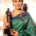 Mumbai: Actress Kirti Kulhari with the Dadasaheb Phalke award in Mumbai on April 21, 2017. (Photo: IANS) by .