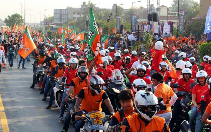 Surat: BJP workers during a bike rally in Surat on April 16, 2017. (Photo: IANS) by .