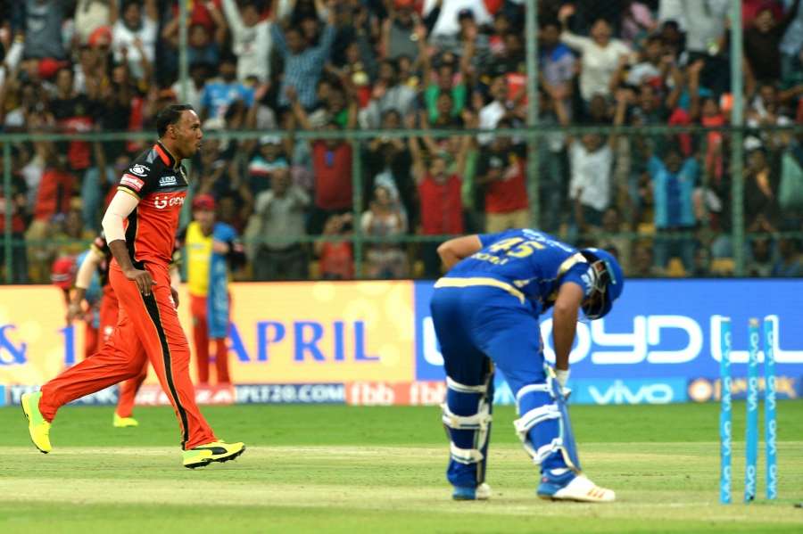 Bengaluru: Samuel Badree of Royal Challengers Bangalore celebrates fall of a wicket during an IPL 2017 match between Royal Challengers Bangalore and Mumbai Indians at M Chinnaswamy Stadium in Bengaluru on April 14, 2017. (Photo: IANS) by .