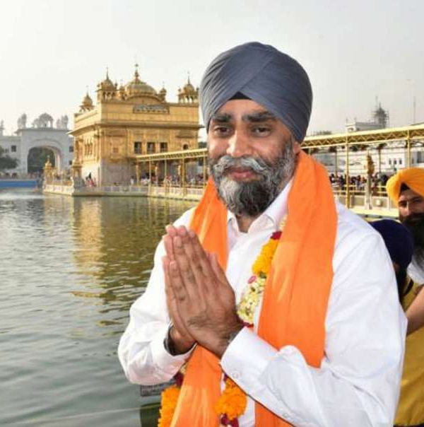 Amritsar: Canadian Defence Minister Harjit Singh Sajjan pays obeisance at the Golden Temple in Amritsar on April 20, 2017. (Photo: IANS) by .
