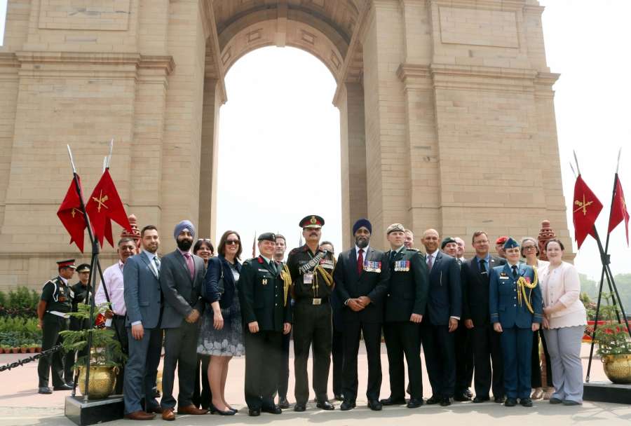 New Delhi: Canadian Defence Minister Harjit Singh Sajjan pays tribute at Amar Jawan Jyoti, India Gate in New Delhi on April 18, 2017. (Photo: IANS) by .