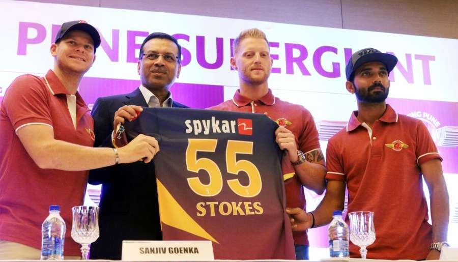 New Delhi: RP Sanjiv Goenka Group chairman and Rising Pune Supergiants owner Sanjiv Goenka captain Steve Smith, Ajinkya Rahane and Ben Stokes during a press conference ahead of IPL Season - 10 in New Delhi on March 30, 2017. (Photo: IANS) by .