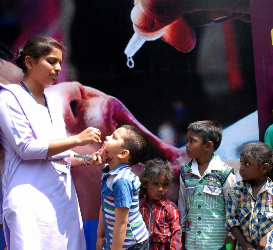 Bengaluru: Children being administered polio drops in Bengaluru on April 2, 2017. (Photo: IANS) by .