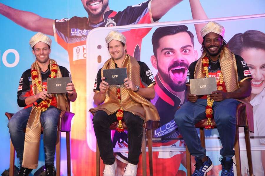 Bengaluru: Royal Challengers Bangalore players AB De Villiers, Shane Watson and Chris Gayle during a promotional event in Bengaluru on May 13, 2016. (Photo: IANS) by .