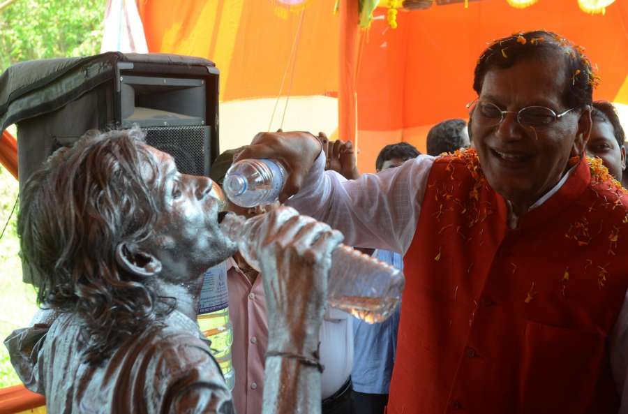 West Midnapore: Sociologist and founder of Sulabh International Dr.Bindeshwar Pathak pours drinking water to a live model in West Midnapore district of West Bengal on March 28, 2017. Sulabh inaugurated a project where pure drinking water will be made available to villagers in arsenic affected areas at negligible prices. (Photo: Partha Mitra/ IANS) by .