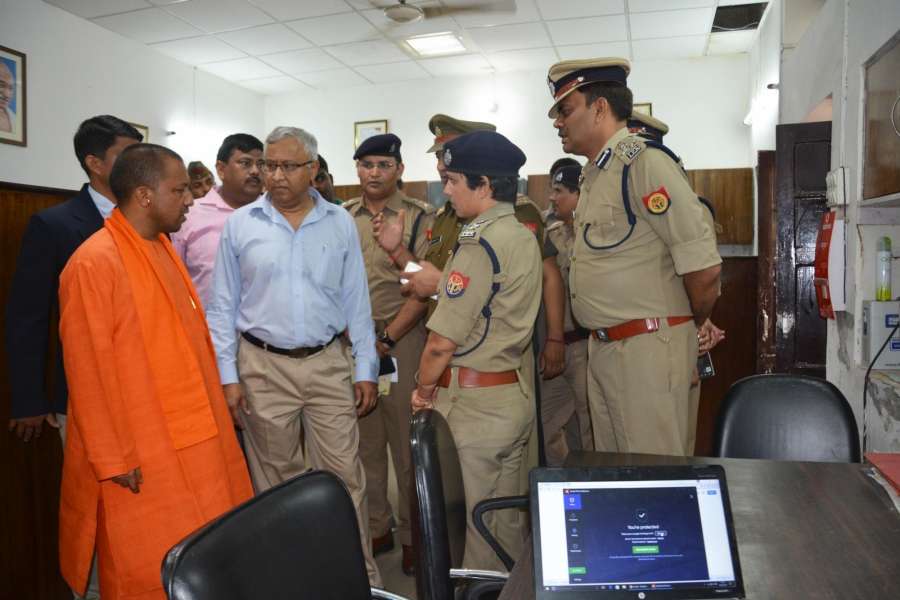 Lucknow: Uttar Pradesh Chief Minister Yogi Adityanath during his surprise visit to Hazratganj police station in Lucknow on March 23, 2017. (Photo: IANS) by .