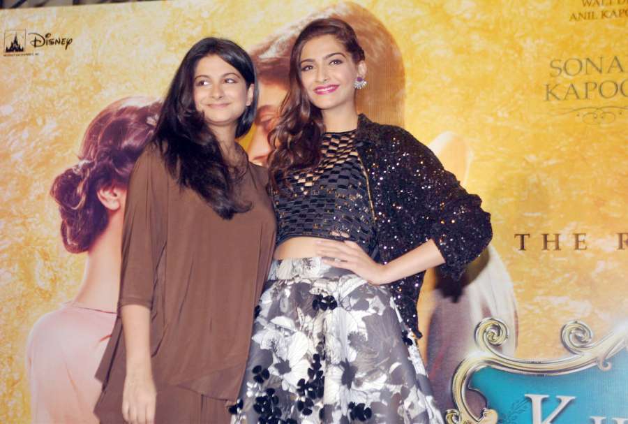 Actors Sonam Kapoor and Fawad Khan with Sonam Kapoor`s sister and filmmaker Rhea Kapoor during the music launch of forthcoming film Khoobsurat in Mumbai, on Sept. 5, 2014. (Photo: IANS) by .