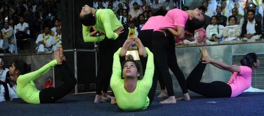 New Delhi: Women perform yoga during the inauguration of the International Yoga Fest, in New Delhi on March 8, 2017. (Photo: IANS) by .