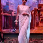Mumbai: A model walks the ramp during the fashion show, The Conclusion, a collection inspired by the film Baahubali 2 in Mumbai on April 7, 2017. (Photo: IANS) by .