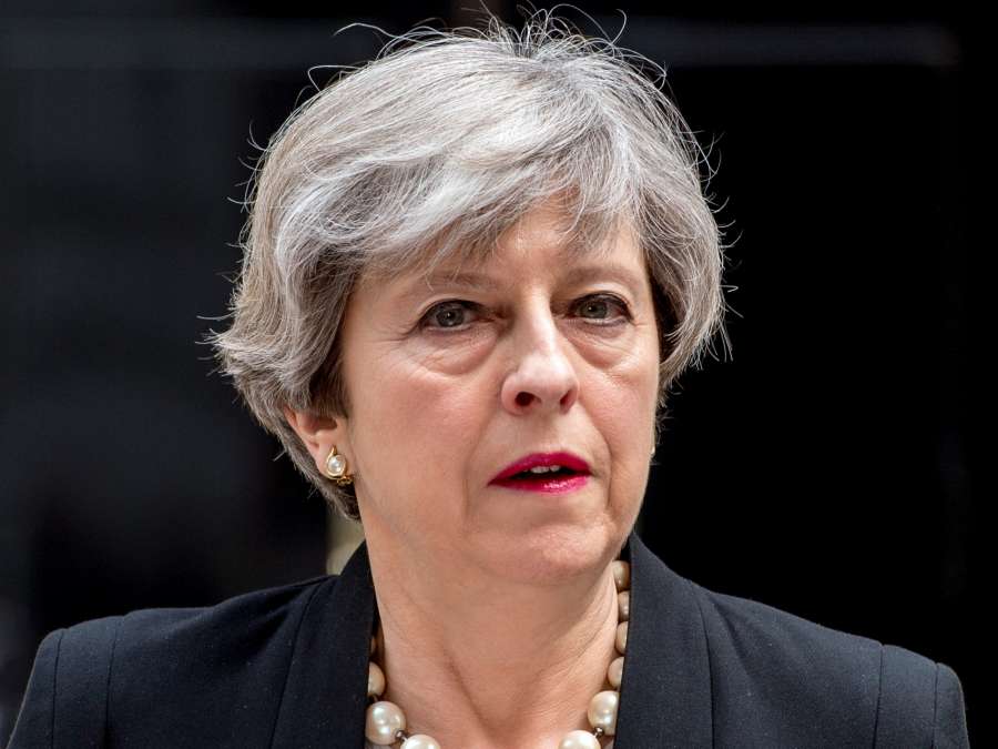 LONDON, May 23, 2017 (Xinhua) -- Britain's Prime Minister Theresa May addresses the media in Downing Street after chairing a meeting of Britain's emergency security committee following the Manchester terror attack in London, Britain on May 23, 2017. British Prime Minister Theresa May said police know the name of the suicide bomber who killed 22 adults and children and injured 59 others in Manchester. (Xinhua/IANS) by .