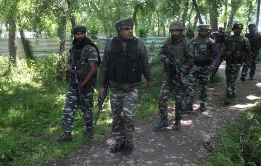 Pulwama: Soldiers during an encounter with militants in Pulwama on May 27, 2017. Hizbul Mujahideen commander, Sabzar Bhat who succeeded slain militant, leader Burhan Wani, was killed along with another militant in the gunfight. (Photo: IANS) by .