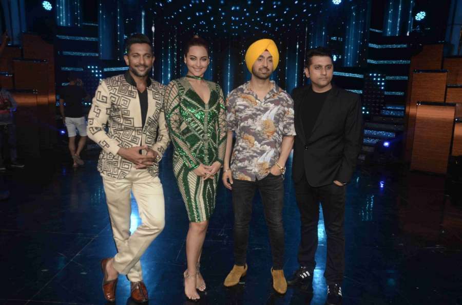 Mumbai: Choreographer Terence Lewis, actors Sonakshi Sinha, Diljit Dosanjh and filmmaker Mohit Suri during the promotion of film Super Singh on the sets of Star Plus TV show Nach Baliye Season 8 in Mumbai, on June 13, 2017. (Photo: IANS) by .