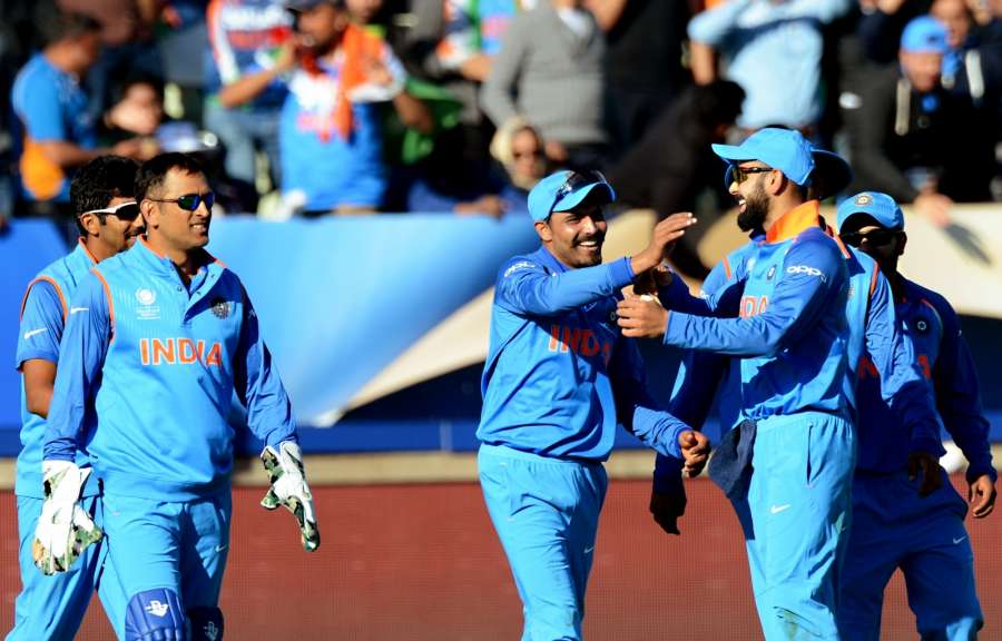 Birmingham: Indian captain Virat Kohli along with MS Dhoni and Ravindra Jadeja celebrates fall of a wicket during ICC Champions Trophy, Group B match between India and Pakistan at Edgbaston, Birmingham, UK on June 4, 2017. (Photo: Bipin Patel/IANS) by .