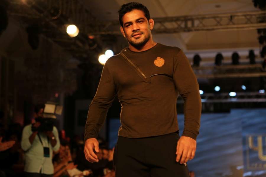 Mumbai: Indian wrestler Sushil Kumar during the launch of Indian cricket player Yuvraj Singhs clothing brand YWC designed by fashion designers Shantanu and Nikhil, in Mumbai. The royalties from the sale will support YouWeCan, a NGO for empowerment of cancer patients and survivors. (Photo: IANS) by .