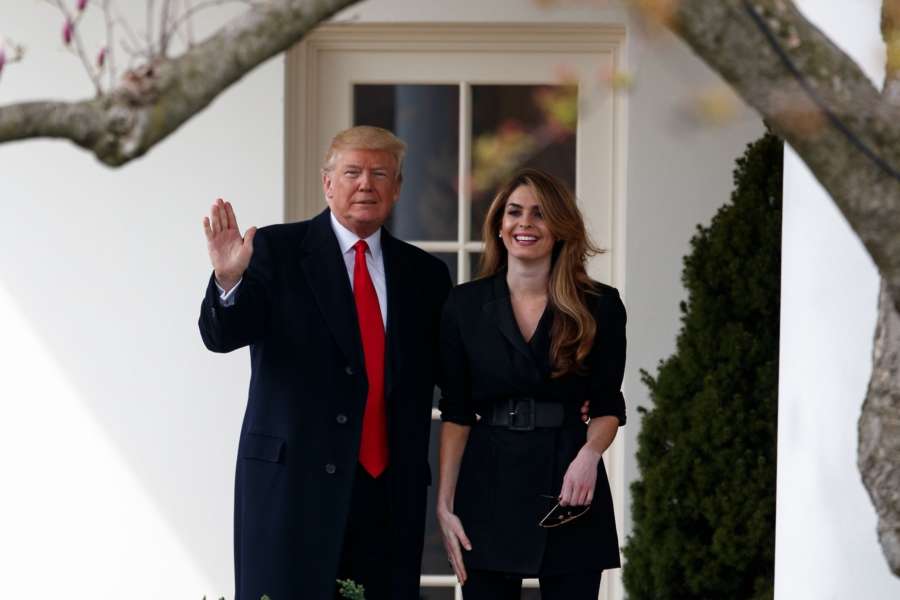 WASHINGTON, March 29, 2018 (Xinhua) -- U.S. President Donald Trump (L) poses with outgoing White House Communications Director Hope Hicks on the West Wing Colonnade before departing from the White House in Washington D.C., the United States, on March 29, 2018. (Xinhua/Ting Shen/IANS) by .