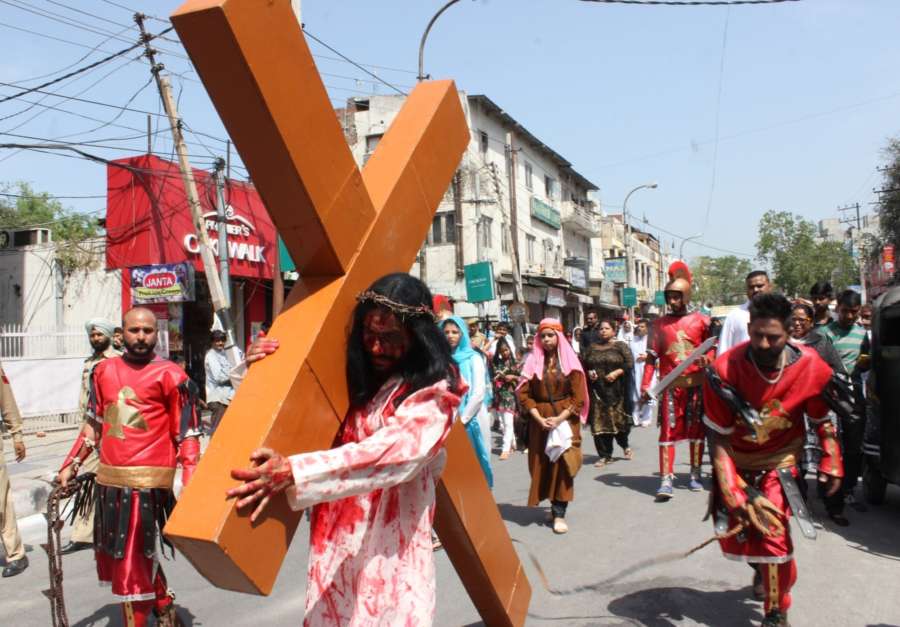Jammu: Devotees participate in a re-enactment of crucifixion of Jesus Christ on Good Friday in Jammu on April 14, 2017. (Photo: IANS) by .