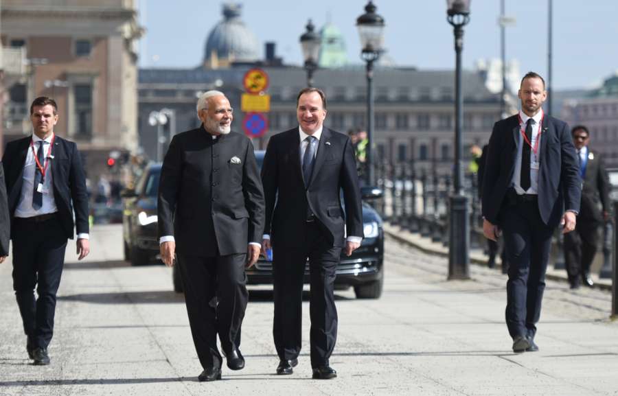 Stockholm: Prime Minister Narendra Modi and his Swedish counterpart Stefan Lofven take a short walk from Sager House to Rosenbad, in Stockholm, Sweden on April 17, 2018. (Photo: IANS/PIB) by .