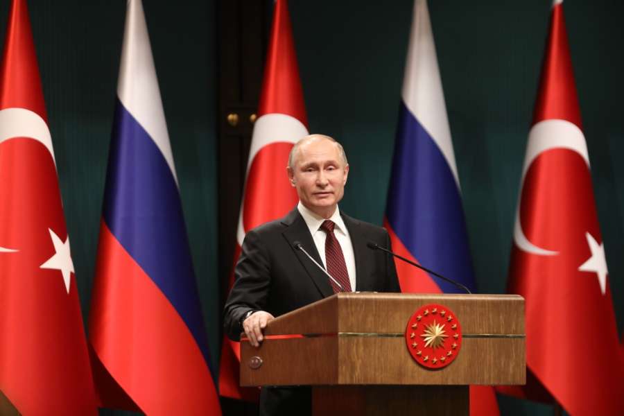 ANKARA, April 3, 2018 (Xinhua) -- Russian President Vladimir Putin attends a joint press conference with Turkish President Recep Tayyip Erdogan (not in the picture) following their meeting in Ankara, Turkey, April 3, 2018. Vladimir Putin said Tuesday that Russia and Turkey agreed to bring forward the delivery of the S-400 missile defense systems to Turkey. (Xinhua/Mustafa Kaya/IANS) by .