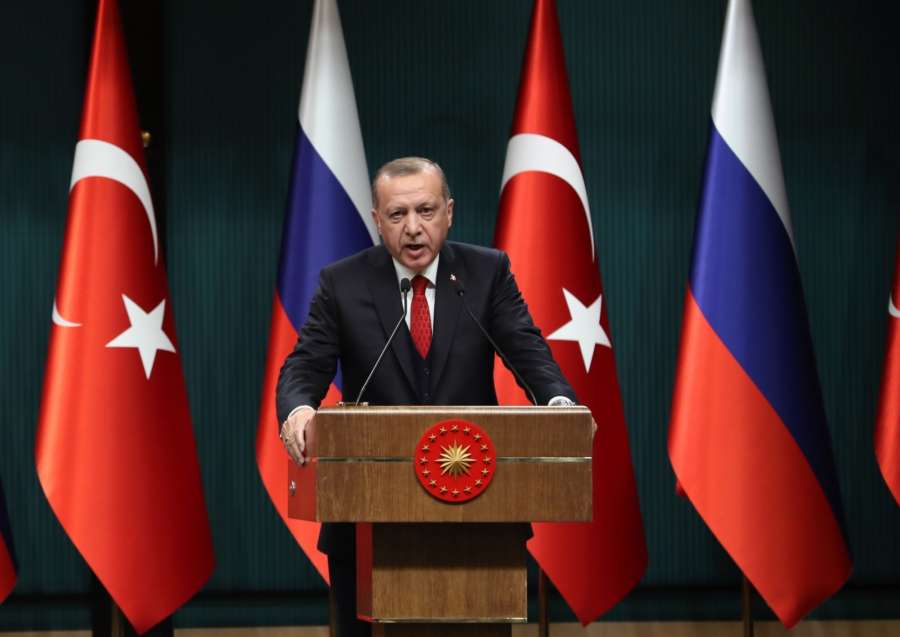 ANKARA, April 3, 2018 (Xinhua) -- Turkish President Recep Tayyip Erdogan attends a joint press conference with Russian President Vladimir Putin (not in the picture) following their meeting in Ankara, Turkey, April 3, 2018. Vladimir Putin said Tuesday that Russia and Turkey agreed to bring forward the delivery of the S-400 missile defense systems to Turkey. (Xinhua/Mustafa Kaya/IANS) by .