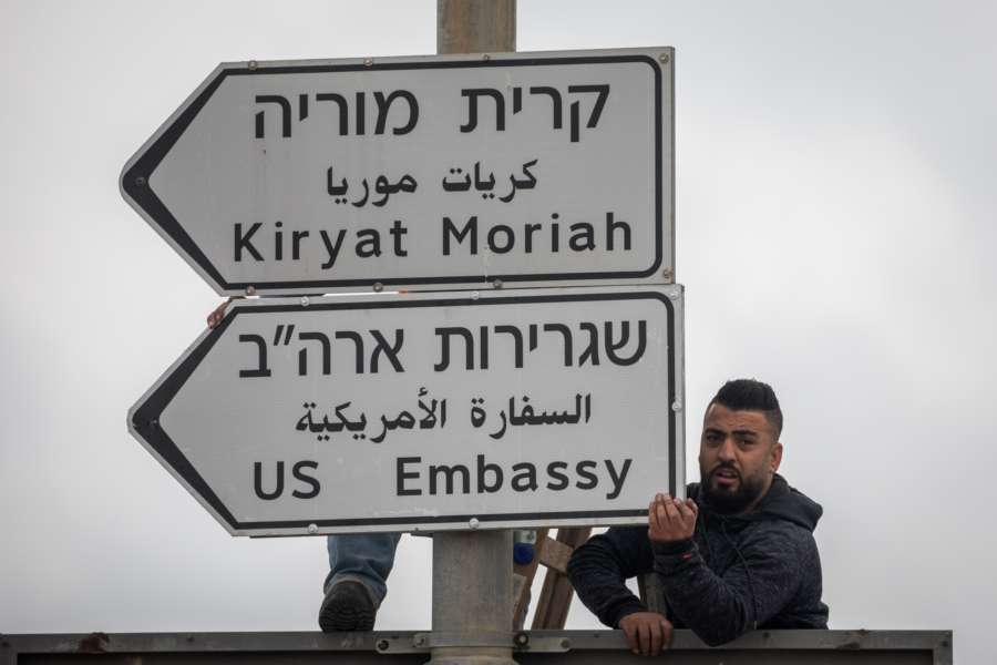 JERUSALEM, May 7, 2018 (Xinhua) -- Jerusalem municipal workers install a road sign of "U.S. Embassy" in Jerusalem, on May 7, 2018. U.S. President Donald Trump on Monday announced the designation of a presidential delegation to Israel to attend the opening of the U.S. embassy. According to a White House statement, the opening ceremony will be on May 14. (Xinhua/JINI/IANS) by .