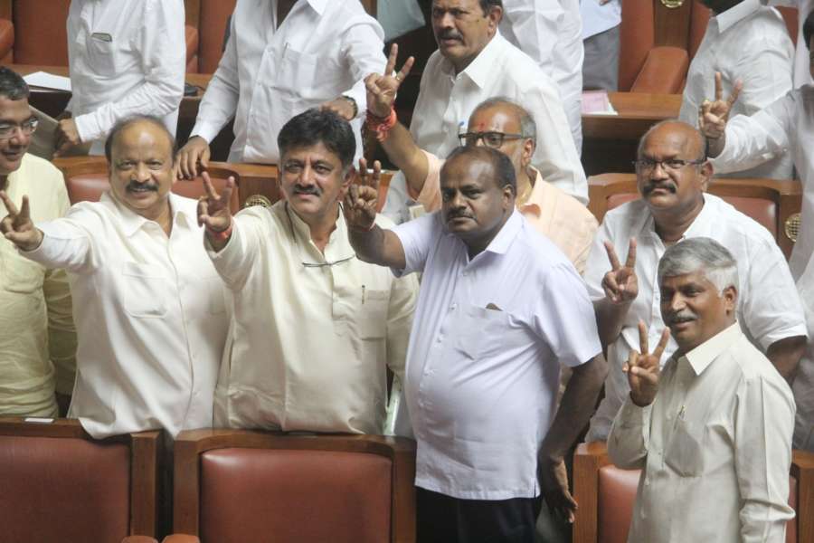 Bengaluru: JD(S) MLA H.D. Kumaraswamy and Congress MLA D. K. Shivakumar celebrate along with other legislators of both the parties after Karnataka Chief Minister B.S. Yeddyurappa resigned before facing a crucial trust vote in the Karnataka Assembly with numbers stacked against the BJP in the newly elected House; in Bengaluru on May 19, 2018. (Photo: IANS) by .