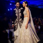 Mumbai: Actors Ranbir Kapoor and Deepika Padukone showcase creation of fashion designer Manish Malhotra at "The Walk of Mijwan" in Mumbai on April 19, 2018 . (Photo: IANS) by .