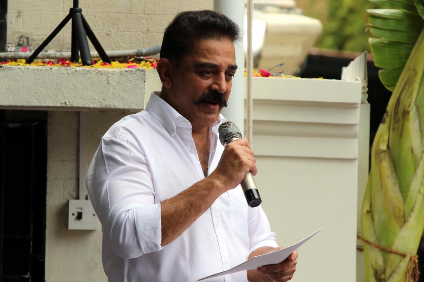 Chennai: Makkal Needhi Maiam (MNM) chief Kamal Hassan addresses party workers after hoisting his party's flag and announcing the names of his party's office bearers at the party office at Alwarpet, in Chennai on July 12, 2018. (Photo: IANS) by .