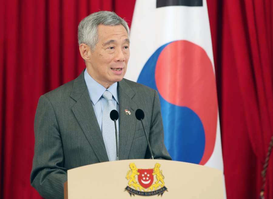 Singapore: Singapore Prime Minister Lee Hsien Loong speaks during a joint press conference with South Korean President Moon Jae-in at the presidential palace in Singapore on July 12, 2018. Moon and Lee agreed to further strengthen the countries' economic and diplomatic cooperation while also working to promote free trade and peace in their region.(Yonhap/IANS) by .