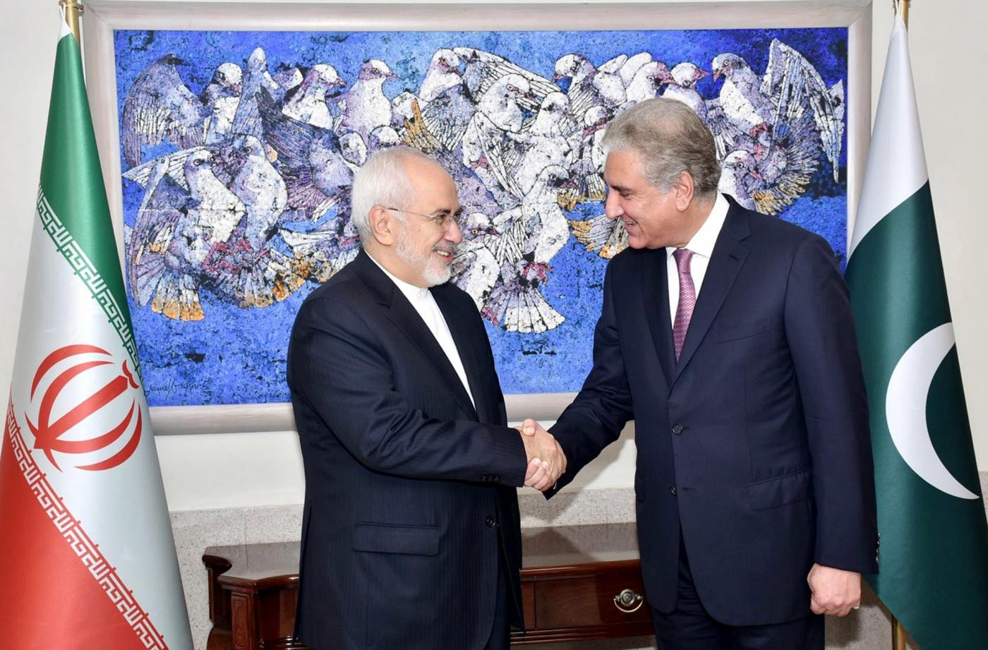 ISLAMABAD, Aug. 31, 2018 (Xinhua) -- Photo released by Pakistan's Press Information Department (PID) on Aug. 31, 2018 shows that Pakistani Foreign Minister Shah Mahmood Qureshi (R) shakes hand with his Iranian counterpart Mohammad Javad Zarif in Islamabad, capital of Pakistan. Pakistan on Friday expressed its support to Iran on the international nuclear deal related to the Iranian nuclear issue during talks between foreign ministers of the two countries, the Foreign Ministry said. (Xinhua/PID/IANS) by .